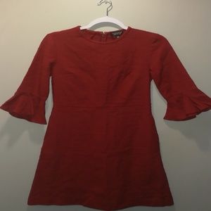Red dress with ruffled sleeves
